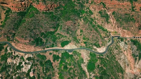 Top-down aerial of winding road through arid mountain terrain, Cape Town Stock Footage 339191216