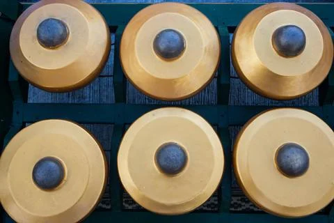 Top Down Angle View of Golden Bonang Gongs arranged in Frame from Tradition.. Stock Photos