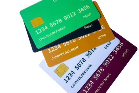 Top-down angled view of a cascading stack of multi-colored credit and debit.. Stock Photos