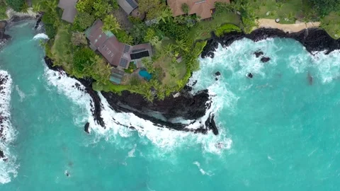 Top-Down Ascending Aerial Orbit of Luxury Beachfront Villa and Private Pool, Stock Footage 328388081