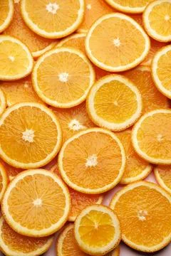 Top down background view made of Fresh Sliced organic oranges close-up Stock Photos