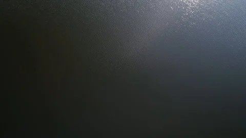 Top down bird eye view of water waves in a lake. Close up 4K. Stock Footage 111136128