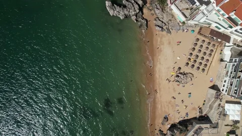 Top down birds eye view of Praia da Rainha in Cascais, Portugal Stock Footage 195504121