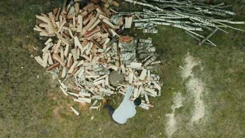 Top Down Birds Eye View Of Man Chopping Wood Splitting A Log With An Axe Stock Footage 238547715