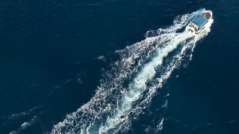 Top Down Boat ride in deep blue water, at Akamas Cyprus  Stock Footage 167596556