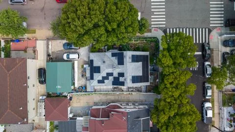Top-Down Building Pattern Near a Marked Crosswalk Photos