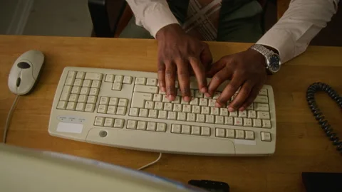 Top Down of Businessman Typing on Retro Keyboard and Using Mouse Stock Footage 341420129