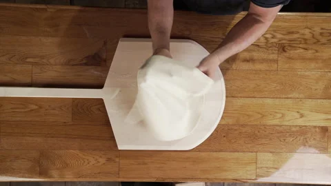 TOP DOWN CHEF MAKING PIZZA DOUGH FROM SCRATCH Stock Footage 130416531