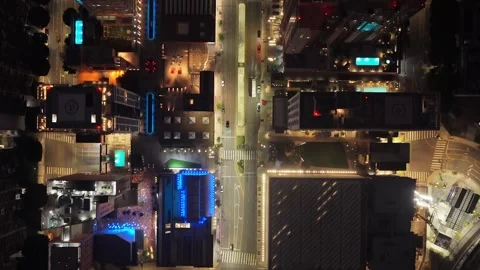 Top down cityscape of downtown Los Angeles at night, showcasing illuminated skys Stock Footage 336634226
