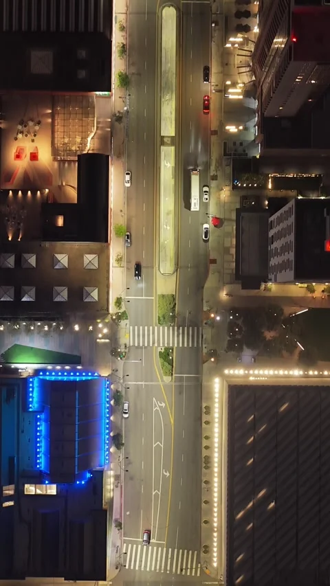 Top down cityscape of downtown Los Angeles at night, showcasing illuminated skys Stock Footage 337415930