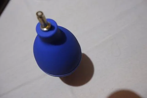 Top Down Close Up of Blue Rubber Air Blower Nozzle on White Background Stock Photos