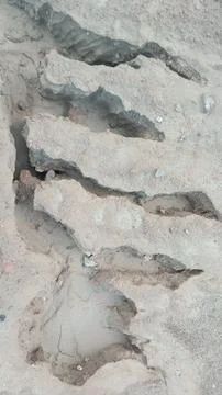 Top Down Close Up of Deep Soil Erosion Gullies and Fractured Earth Pattern Stock Photos