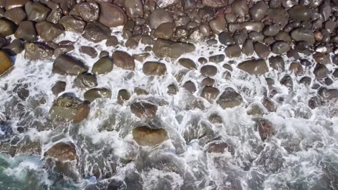 Top down close up drone shot of clean turquoise water splashes running Stock Footage 242990350