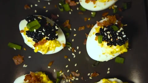 Top Down Close Up of Gourmet Deviled Eggs With Caviar 스톡 동영상 331493177