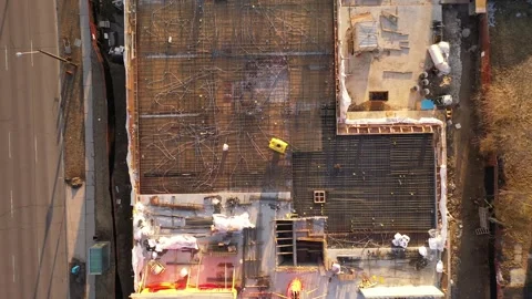 Top Down Close Up Shot Over Active Urban Construction Site and Tower Crane Vídeos de archivo 328848369