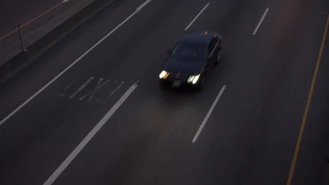 Top-down closeup inbound highway traffic in the evening 스톡 동영상 91241904