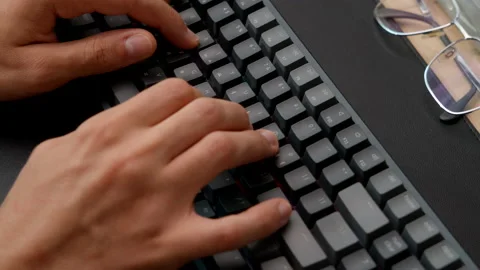Top Down Closeup of Man Typing on A Mechanical Keyboard at Home Office Stock Footage 217957465