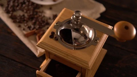 Top down of a coffee mill, beans, cinnamon and pot Stock Footage 95201625