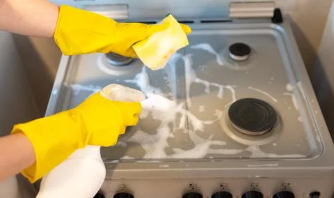 Top-down Cooktop Scrub. Foamy Detergent Stock Photos