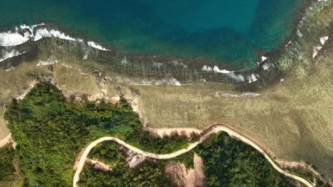 Top Down Coron Reef Shoreline With Coastal Road Stock Footage 335523780