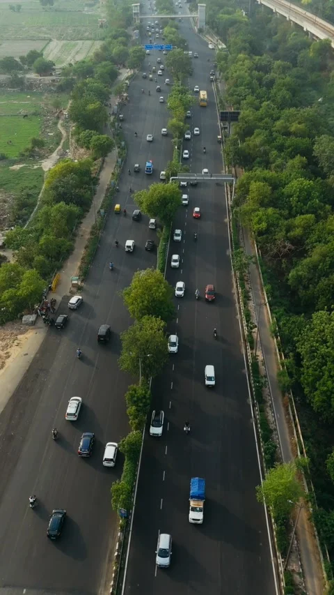 Top down cross traffic highway with cars, trucks at Noida Freeway. Stock Footage 317940936