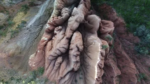 Top down of deeply wrinkled mud ridges and layered clay in Kazakhstan Stock Footage 338129692