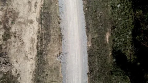 Top down on a dirt road Stock Footage 294040877
