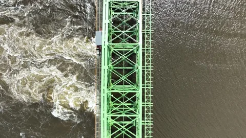 Top down dolly motion over greed bridge. Video stock 248677198