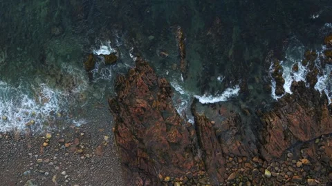 Top Down Dolly Right Over Jagged Rocky Coastline of Thacher Island, Revealing Видео 338127276
