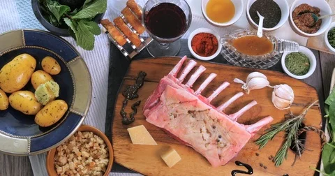 Top down dolly view of ingredients for minted rack of lamb Stock Footage 73526492