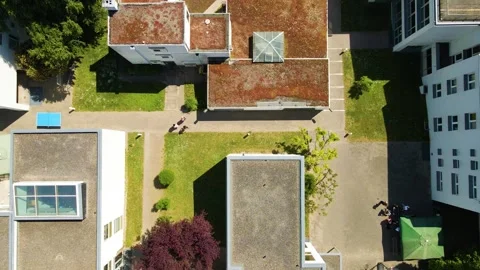 Top down drift over Mediacampus Frankfurt Bauhaus campus Stock Footage 331874214