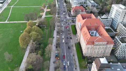 Top down drift over river road toward twin towers Stock Footage 331199178