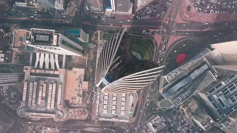 Top Down Drone Aerial of Kuwait City Downtown Blocks, Twisting Roof Skyscraper Stock Footage 324950919