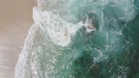 Top down drone aerial view of rocky Cabo San Lucas beach coastline. Stock Footage 134594989