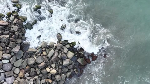 Top Down Drone Aerial View of Clear Turquoise Sea Water Crashing Stock Footage 345953273