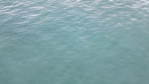Top Down Drone Aerial View of Calm Turquoise Sea Water Surface Stock Footage 345953338