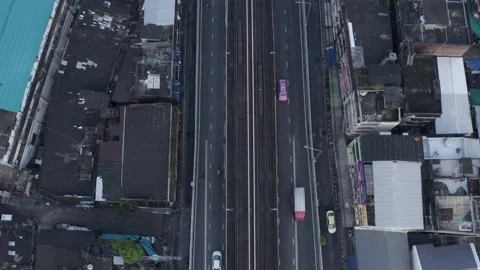 Top down drone birds eye view of highway on Sukhumvit street in Bangkok, the Stock Footage 228804321