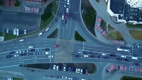 Top down drone of busy city intersection time lapse at dusk Video stock 320830351