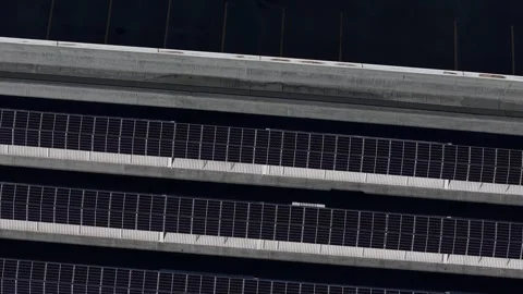 Top down drone close up of solar photovoltaic panels mounted in parallel rows Vídeos de archivo 329548482