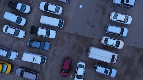 Top-Down Drone Descent Over Mixed Vehicle Parking Lot Stock-Footage 311048823