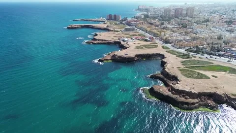Top-Down Drone Flight Along Crystal Coastline Vídeos de archivo 307702721