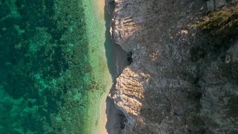 Top Down Drone Flight Along Spiaggia di Sansone Beach  Turquoise Water and .. Stock Footage 326471906