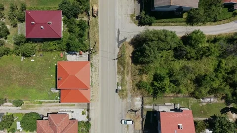Top down drone flight along a rural road in Bulgaria 스톡 동영상 344627088