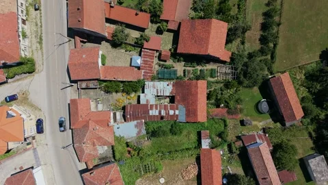 Top down drone flight over village backyards in Bulgaria Stock-Footage 344628257