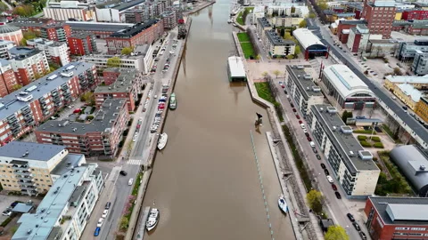 Top-Down Drone Flight Rising Above Aura River Towards the Sea, Turku, Finland Stock Footage 310742930
