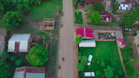 Top-down drone following road in Impfondo, Congo Stock Footage 331999506