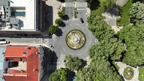 Top-Down Drone Footage of a Coimbra City Traffic Roundabout Stock-Footage 345840345