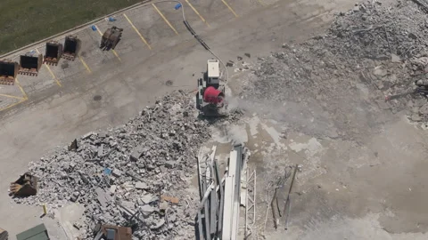 Top down drone footage of destroyed site. Equipment that destroys buildings. Stock-Footage 291594307