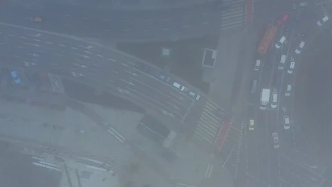 Top down drone footage of traffic in smog Stock Footage 126118933