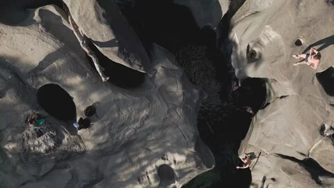 Top-down drone forward flyover above quartzite potholes at Vale da Lua Brazil Stock Footage 341301870